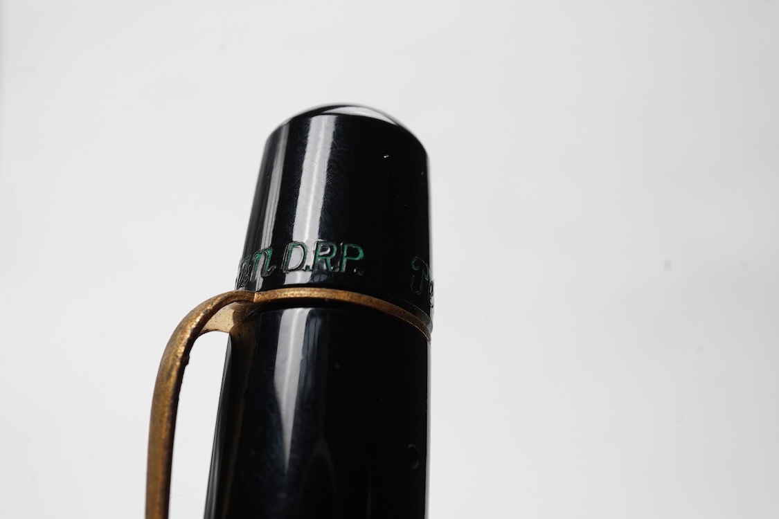 A Pelikan 100N fountain pen fitted with a 14ct. gold Pelkan nib